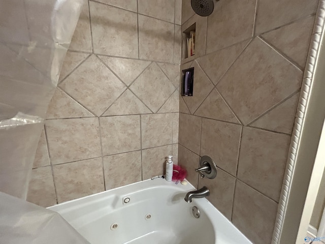 bathroom with shower / bath combo with shower curtain