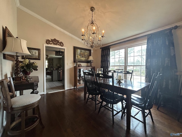 dining area with hardwood / wood-style flooring, ornamental molding, vaulted ceiling, and a notable chandelier