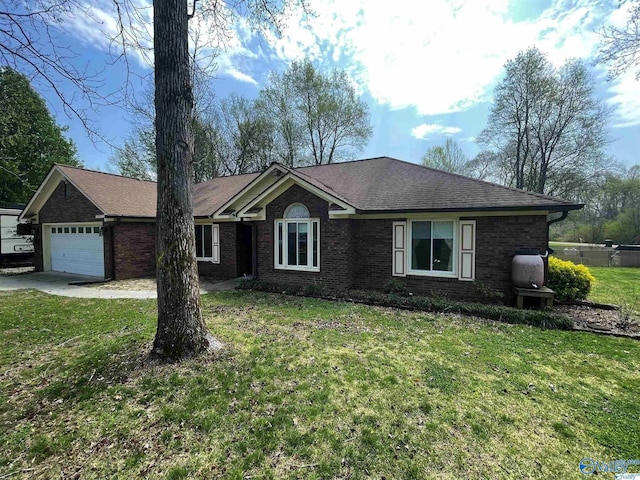 100 Doe Creek Cir, Toney, AL 35773 - single story home featuring brick siding, a front yard, a garage, a shingled roof, and concrete driveway