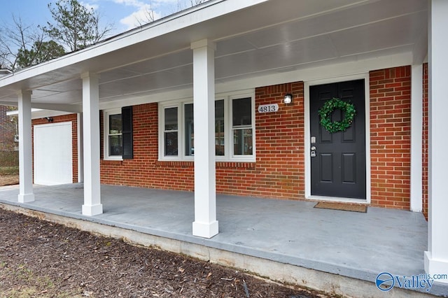 entrance to property with covered porch