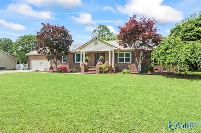 ranch-style home with concrete driveway, covered porch, a front yard, brick siding, and a garage