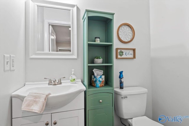 half bath with toilet and vanity