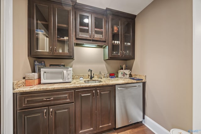 3 Mcmullen Ln, Gurley, AL 35748 - bar with dishwasher, white microwave, a sink, wood finished floors, and baseboards