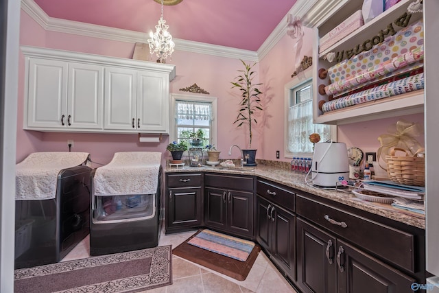 3 Mcmullen Ln, Gurley, AL 35748 - clothes washing area featuring a sink, crown molding, light tile patterned flooring, washer / clothes dryer, and a chandelier