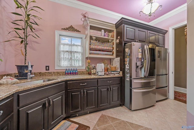 3 Mcmullen Ln, Gurley, AL 35748 - kitchen with stainless steel fridge, a sink, light tile patterned floors, crown molding, and light stone countertops