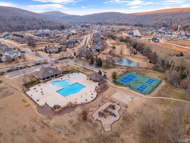 3 Mcmullen Ln, Gurley, AL 35748 - aerial view of property and surrounding area with a pool, nearby suburban area, and a mountainous background