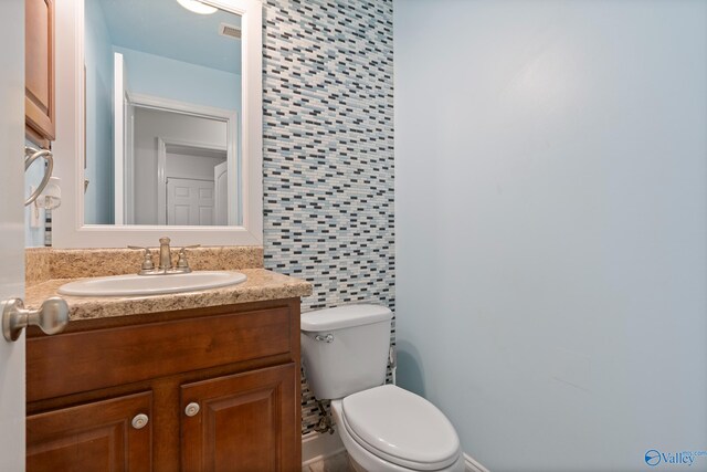 15813 Cold Branch Dr NW, Harvest, AL 35749 - bathroom featuring toilet and vanity