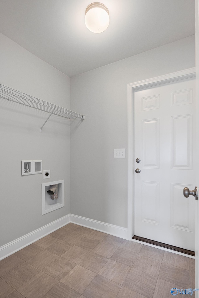 laundry area featuring hookup for a washing machine, laundry area, hookup for an electric dryer, and baseboards