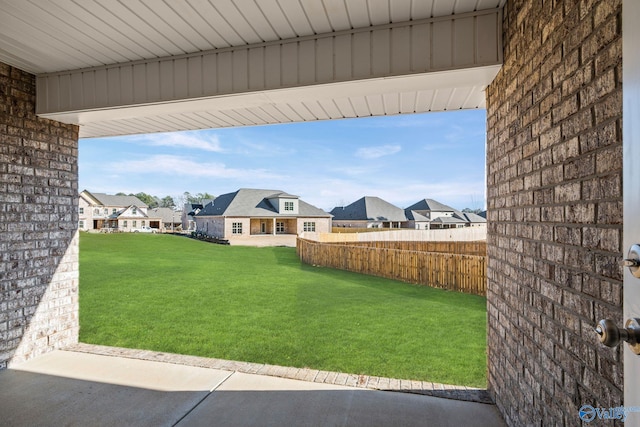 view of yard featuring a residential view