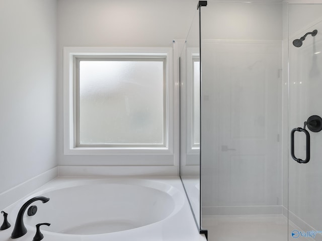 183 Saddle St, New Market, AL 35761 - full bathroom with a garden tub, a shower stall, and plenty of natural light