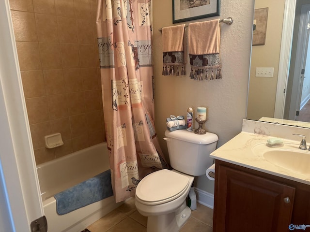 full bathroom with tile patterned flooring, shower / bathtub combination with curtain, vanity, and toilet