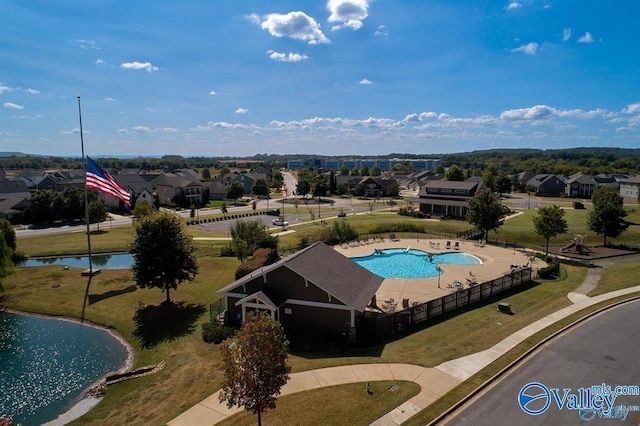aerial view featuring a water view and a residential view