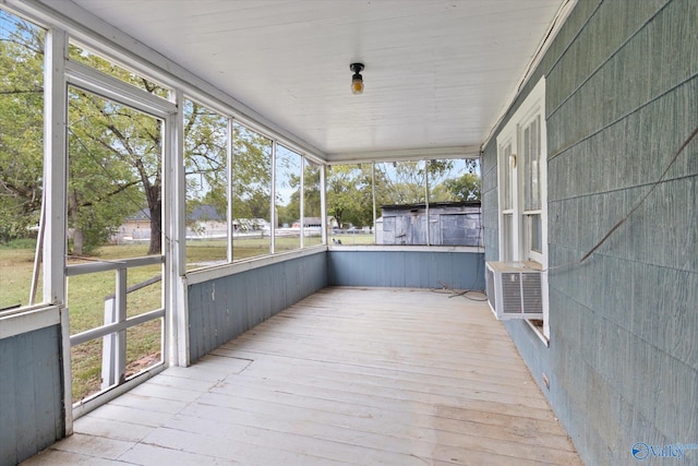 unfurnished sunroom featuring a wealth of natural light