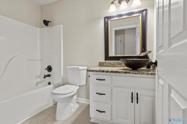 full bathroom with shower / bathing tub combination, vanity, tile patterned flooring, and toilet