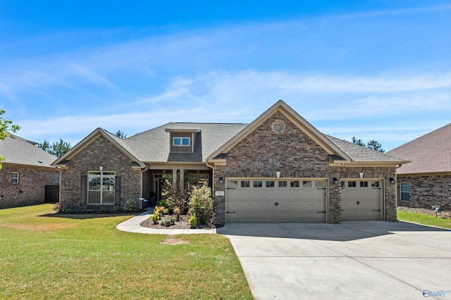 7531 Hadleigh Crst, Owens Cross Roads, AL 35763 - view of front of house with brick siding, a garage, driveway, a front yard, and roof with shingles