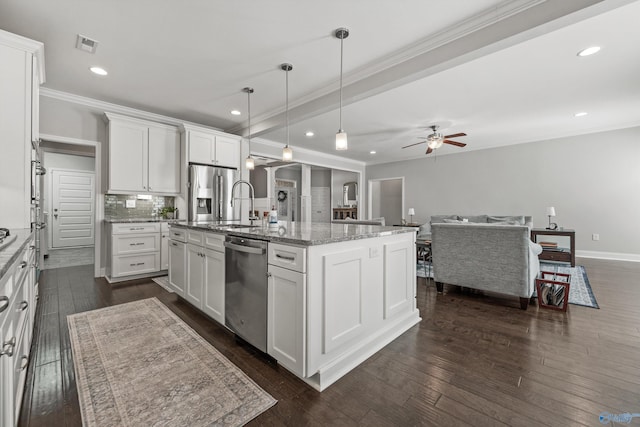 7531 Hadleigh Crst, Owens Cross Roads, AL 35763 - kitchen featuring stainless steel appliances, ornamental molding, a kitchen island with sink, white cabinets, and ceiling fan