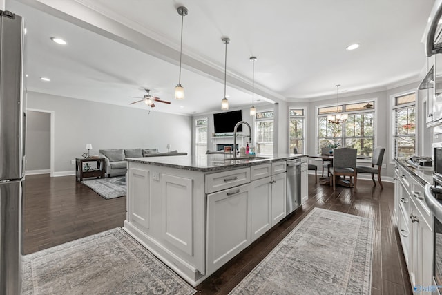 7531 Hadleigh Crst, Owens Cross Roads, AL 35763 - kitchen with a sink, dark wood finished floors, a chandelier, stainless steel appliances, and crown molding