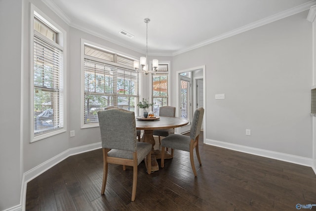 7531 Hadleigh Crst, Owens Cross Roads, AL 35763 - dining space with a chandelier, baseboards, crown molding, and dark wood-type flooring