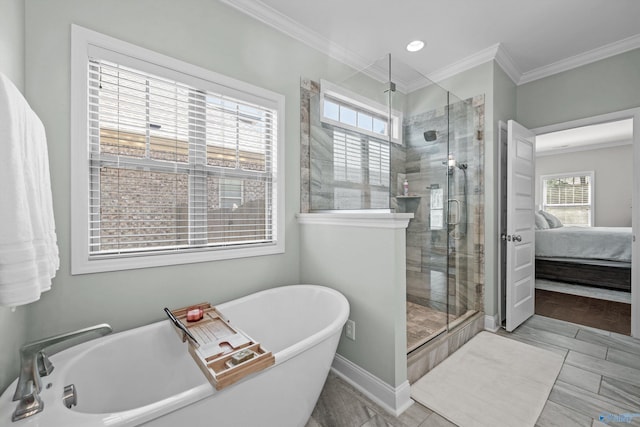 7531 Hadleigh Crst, Owens Cross Roads, AL 35763 - ensuite bathroom with a stall shower, a freestanding tub, plenty of natural light, ornamental molding, and baseboards