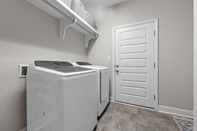 7531 Hadleigh Crst, Owens Cross Roads, AL 35763 - laundry room featuring washer and clothes dryer and baseboards