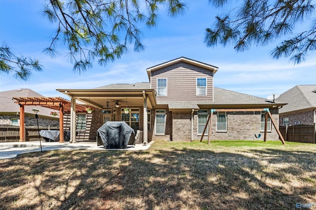 7531 Hadleigh Crst, Owens Cross Roads, AL 35763 - rear view of property featuring ceiling fan, a pergola, a patio area, brick siding, and a shingled roof