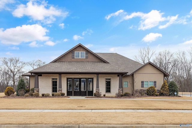 7531 Hadleigh Crst, Owens Cross Roads, AL 35763 - craftsman-style house featuring french doors, roof with shingles, and brick siding