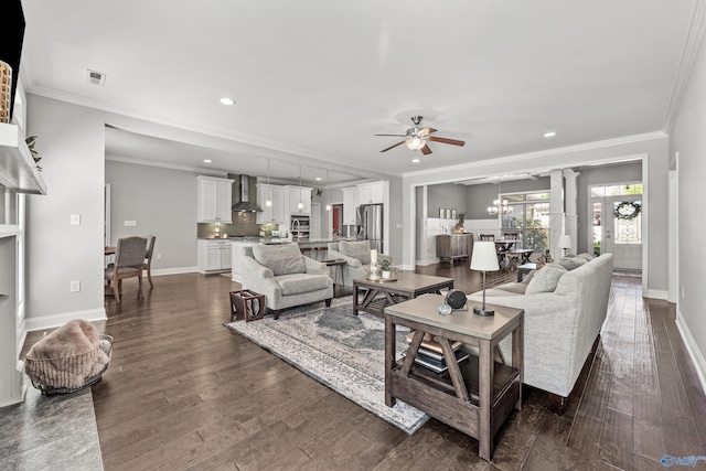7531 Hadleigh Crst, Owens Cross Roads, AL 35763 - living area featuring ceiling fan, dark wood finished floors, baseboards, recessed lighting, and ornamental molding