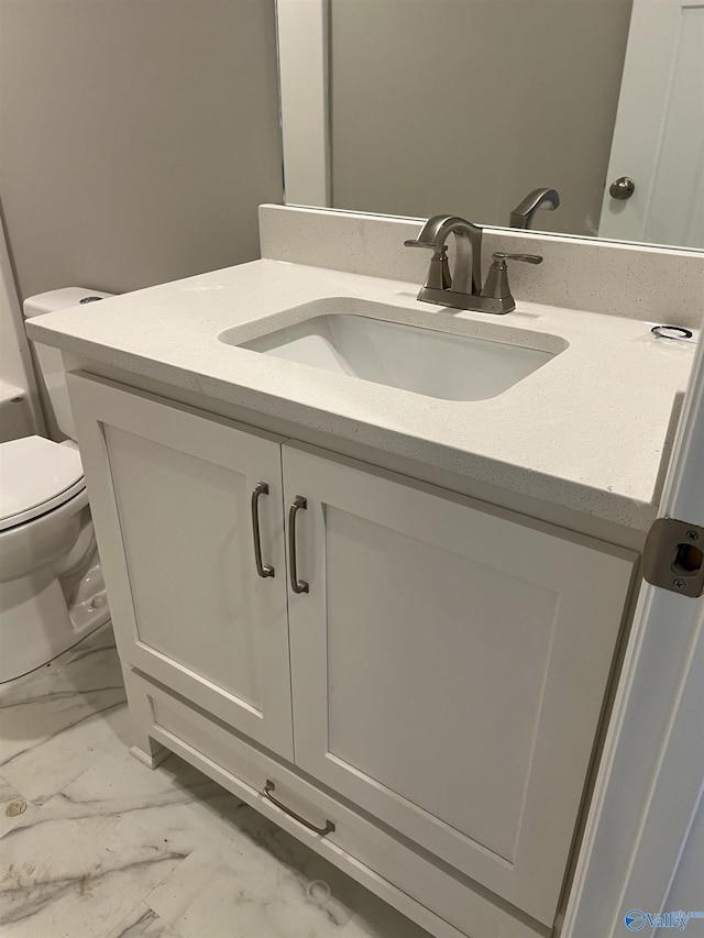 2385 Cedar Ridge Cir, Hokes Bluff, AL 35903 - bathroom featuring marble finish flooring and vanity