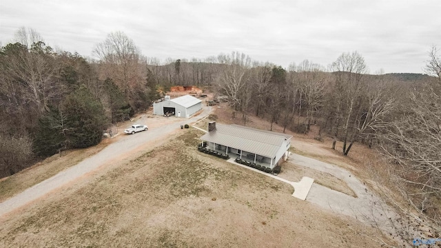 drone / aerial view with a view of trees