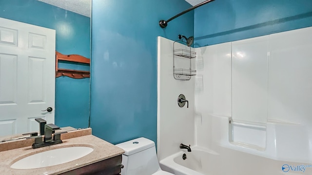 full bathroom featuring vanity,  shower combination, and toilet