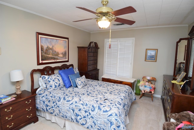 bedroom featuring ceiling fan, light colored carpet, visible vents, baseboards, and ornamental molding