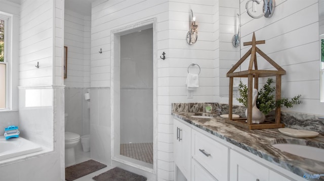 732 Bluff Dr, Rogersville, AL 35652 - bathroom with double vanity, toilet, a bath, and a shower