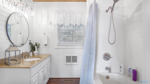 732 Bluff Dr, Rogersville, AL 35652 - full bath featuring shower / tub combo with curtain, vanity, and wood finished floors