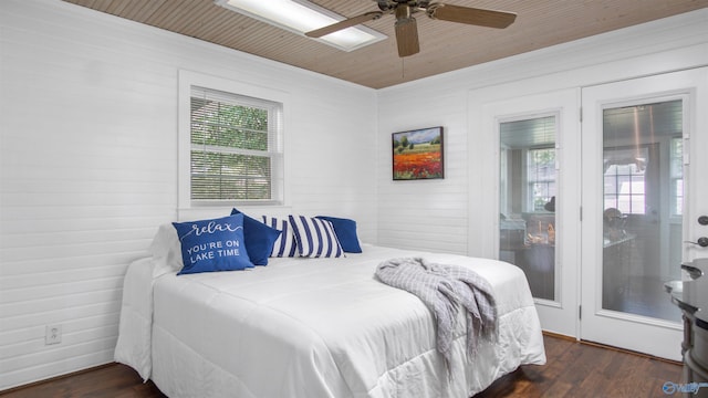 732 Bluff Dr, Rogersville, AL 35652 - bedroom featuring multiple windows, dark wood-style floors, wooden ceiling, and a ceiling fan
