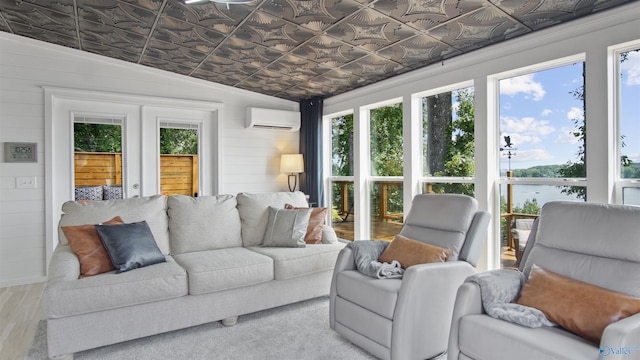 732 Bluff Dr, Rogersville, AL 35652 - living area with a wall mounted air conditioner, healthy amount of natural light, an ornate ceiling, wood finished floors, and wood walls