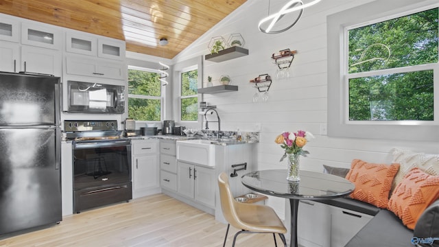 732 Bluff Dr, Rogersville, AL 35652 - kitchen featuring black appliances, lofted ceiling, wood ceiling, open shelves, and light wood-type flooring
