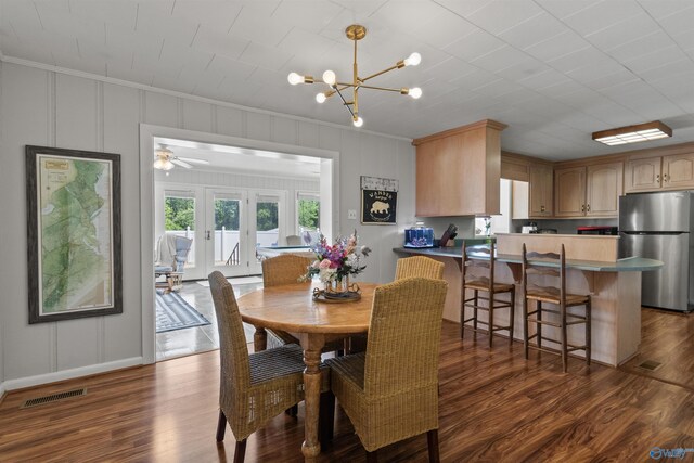 1308 Aston St, Athens, AL 35611 - dining room with visible vents, ornamental molding, dark wood finished floors, and a decorative wall