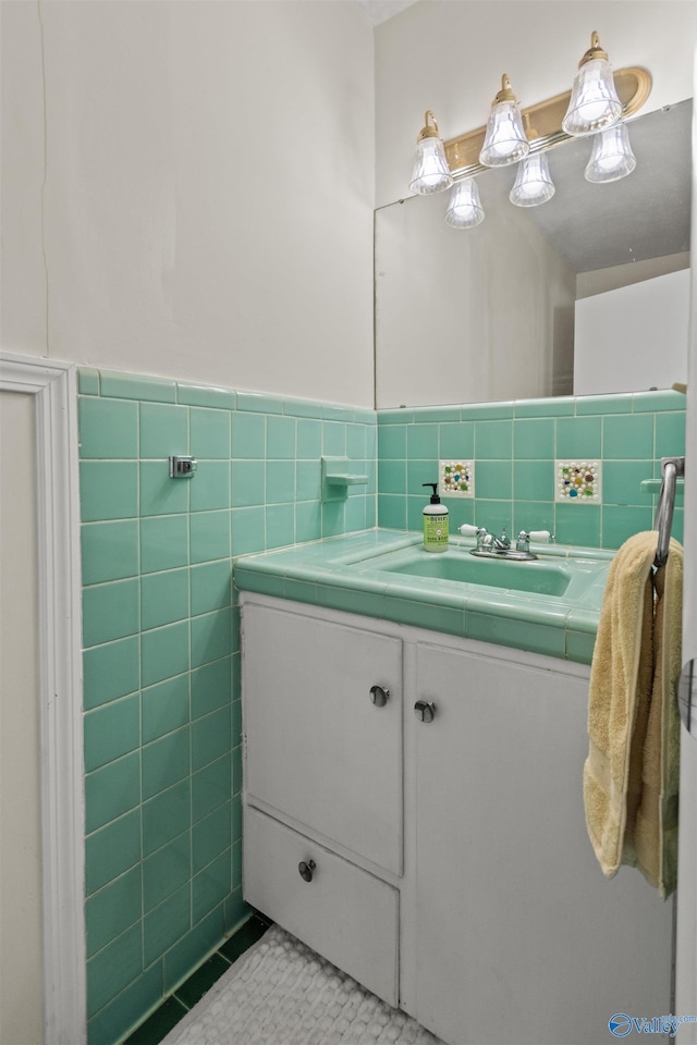 1308 Aston St, Athens, AL 35611 - bathroom with vanity, wainscoting, tile patterned floors, and tile walls