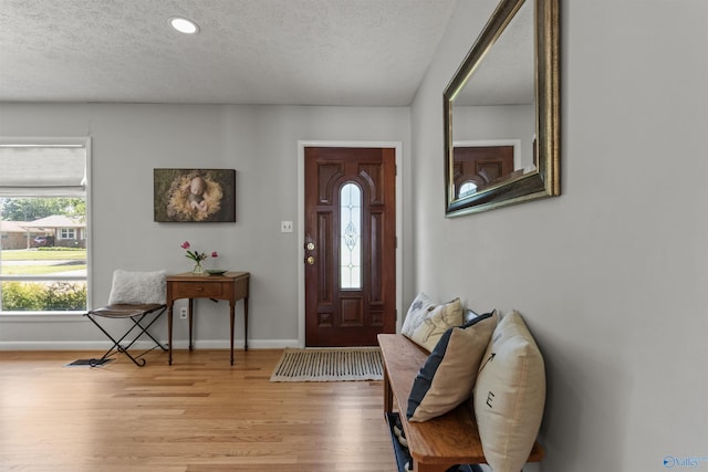 1308 Aston St, Athens, AL 35611 - foyer featuring baseboards, recessed lighting, a textured ceiling, and wood finished floors