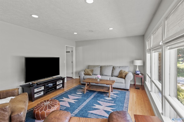 1308 Aston St, Athens, AL 35611 - living area with a textured ceiling and a wealth of natural light