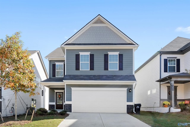 166 Mill Valley Way, New Market, AL 35761 - view of front of property with driveway, a front yard, an attached garage, a shingled roof, and stone siding