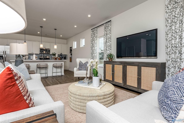 166 Mill Valley Way, New Market, AL 35761 - living area featuring dark wood-style floors and recessed lighting