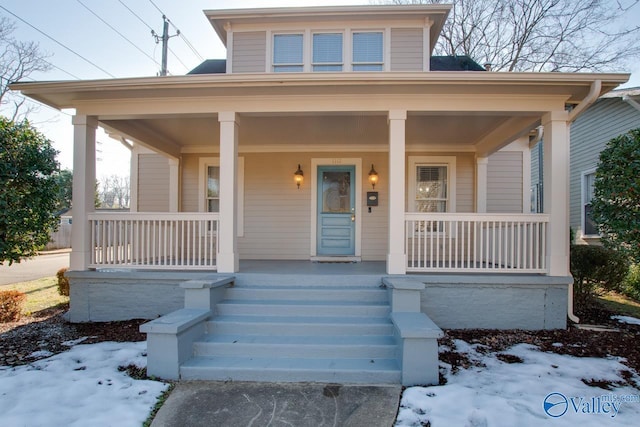 view of front of property featuring covered porch