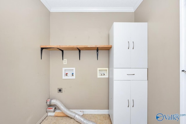 laundry area with cabinets, ornamental molding, hookup for an electric dryer, and hookup for a washing machine