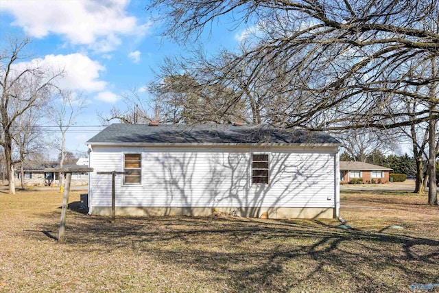 view of property exterior featuring a yard