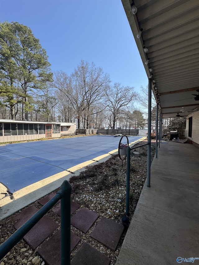 view of yard featuring a ceiling fan