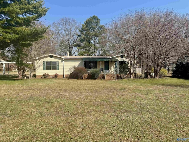 view of front of property with a front yard and a porch
