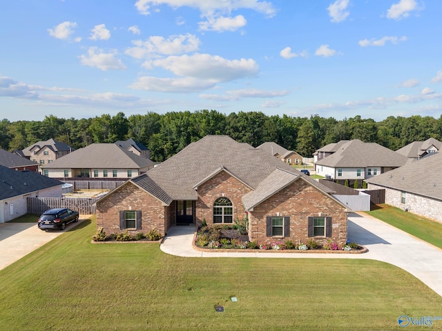 view of front of home featuring a front yard