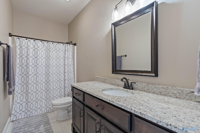 bathroom featuring vanity, toilet, and a shower with shower curtain