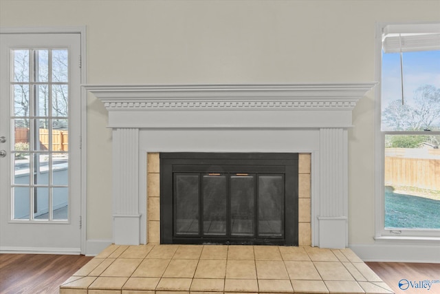 details with a fireplace and hardwood / wood-style flooring